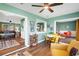 Open floor plan connects the living room, kitchen, and sunroom, creating a welcoming atmosphere at 4500 Great Lake S Dr, Clearwater, FL 33762