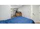 Bright bedroom features a dresser, window, and gray painted walls at 4522 5Th St, Zephyrhills, FL 33542