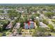 An aerial view of a lovely white home surrounded by lush trees in a vibrant community at 4560 7Th N Ave, St Petersburg, FL 33713