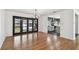 Bright dining room featuring hardwood floors and french doors leading to the backyard at 4560 7Th N Ave, St Petersburg, FL 33713