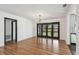 Bright dining room featuring hardwood floors and french doors leading to the backyard at 4560 7Th N Ave, St Petersburg, FL 33713
