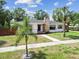 Beautiful home featuring a stone chimney, dark framed windows, and a stone walkway at 4560 7Th N Ave, St Petersburg, FL 33713
