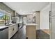 Modern kitchen features new appliances, island, and stylish backsplash at 4560 7Th N Ave, St Petersburg, FL 33713