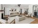 Inviting living room with a fireplace, hardwood floors, and neutral furnishings at 4560 7Th N Ave, St Petersburg, FL 33713