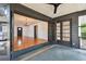 Screened in back porch leads to living room with hardwood floors at 4560 7Th N Ave, St Petersburg, FL 33713
