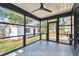 Enclosed patio with tile floors, offering an outdoor seating area for relaxation at 4560 7Th N Ave, St Petersburg, FL 33713