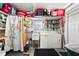 Functional laundry room with a washer, dryer, and sink, offering convenience and efficiency at 5251 Flint St, Zephyrhills, FL 33542
