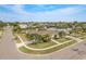 Aerial view of home situated on a corner lot with beautiful landscaping at 5823 Dory Way, Tampa, FL 33615