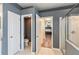 Ensuite bathroom featuring a separate toilet room, shower stall and views into the main bedroom at 6038 Palomaglade Dr, Lithia, FL 33547