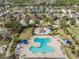 Aerial view of the neighborhood's aquatic center and playground area at 6038 Palomaglade Dr, Lithia, FL 33547