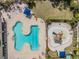 Aerial shot of the community pool and splash park for Gathering-friendly summer fun at 6038 Palomaglade Dr, Lithia, FL 33547