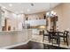 Bright kitchen featuring an island, stone countertops, and stainless steel appliances at 6038 Palomaglade Dr, Lithia, FL 33547