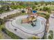 Community splash pad offers a pirate-themed playset with water features, providing a fun and engaging space for to cool off at 6038 Palomaglade Dr, Lithia, FL 33547