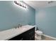 Bathroom featuring modern vanity with ample counter space and updated fixtures at 6110 N Suwanee Ave, Tampa, FL 33604