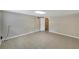 Bright bedroom with tile floors, baseboard trim, and neutral paint at 6110 N Suwanee Ave, Tampa, FL 33604