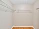 Walk-in closet with built-in wire shelving for optimal storage and organization at 6110 N Suwanee Ave, Tampa, FL 33604