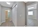 Hallway featuring closet and a doorway leading to another room at 6110 N Suwanee Ave, Tampa, FL 33604