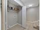 Bright laundry room with tile flooring and washer/dryer hookups at 6110 N Suwanee Ave, Tampa, FL 33604