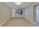 Inviting living room with bright light, and easy access to outdoor living at 6110 N Suwanee Ave, Tampa, FL 33604
