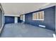 Covered patio with access to screened pool and backyard at 6110 N Suwanee Ave, Tampa, FL 33604