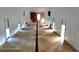 Long, empty room with concrete floors and white walls awaiting customization and renovation at 6234 Neff Lake Rd, Brooksville, FL 34601