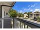 Balcony view looking out over neighborhood with trees and blue sky at 6420 92Nd N Pl # 1205, Pinellas Park, FL 33782