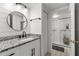 Beautifully renovated bathroom with modern vanity and walk-in shower featuring glass doors at 6420 92Nd N Pl # 1205, Pinellas Park, FL 33782