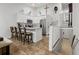 Bright kitchen with marble countertops, stainless steel appliances, and a breakfast bar at 6420 92Nd N Pl # 1205, Pinellas Park, FL 33782