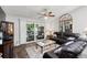 Cozy living room with sliding glass doors leading to outdoor patio space at 6420 92Nd N Pl # 1205, Pinellas Park, FL 33782