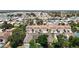 Aerial view of a home community featuring mature trees and water features at 6980 Ulmerton Rd # 7C, Largo, FL 33771