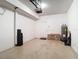 Garage featuring ample space and a garage door at 6980 Ulmerton Rd # 7C, Largo, FL 33771