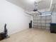 Garage featuring ample space and a garage door at 6980 Ulmerton Rd # 7C, Largo, FL 33771