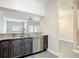 Modern kitchen boasts stainless steel appliances and granite countertops at 6980 Ulmerton Rd # 7C, Largo, FL 33771