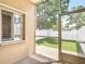 Screened patio area perfect for enjoying the backyard views and outdoor living at 6980 Ulmerton Rd # 7C, Largo, FL 33771