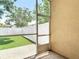 Screened patio offering views of the backyard and lush landscaping, perfect for relaxation at 6980 Ulmerton Rd # 7C, Largo, FL 33771