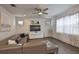 Comfortable living room with stylish furniture, TV, and large windows for natural light at 7307 S Morton St, Tampa, FL 33616