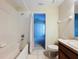 Bright bathroom with shower-tub combination at 7504 Turtle View Dr, Ruskin, FL 33573