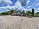 Inviting entrance to Cypress Creek community with manicured landscaping at 7504 Turtle View Dr, Ruskin, FL 33573