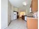 Bright kitchen features tile floors, white appliances, and wood cabinetry, offering both functionality and style at 7504 Turtle View Dr, Ruskin, FL 33573