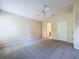 Main bedroom features vaulted ceilings and neutral carpet flooring at 7504 Turtle View Dr, Ruskin, FL 33573