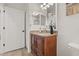 Bathroom showcasing vanity with granite countertop and decorative flower at 7612 S 36Th Ave, Tampa, FL 33619