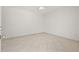 Bright bedroom featuring tiled floors and a ceiling fan at 7612 S 36Th Ave, Tampa, FL 33619