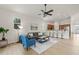 Open-concept living space with kitchen, breakfast bar, and contemporary furnishings at 7612 S 36Th Ave, Tampa, FL 33619