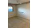 Bedroom with neutral carpet, a ceiling fan, and a grab bar installed on the wall at 7941 58Th N Ave # 106, St Petersburg, FL 33709