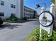 Entrance sign for Lakeview East featuring well-maintained landscaping and clear signage with building in background at 7941 58Th N Ave # 106, St Petersburg, FL 33709