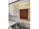 A sink with cabinets and backsplash at 7941 58Th N Ave # 106, St Petersburg, FL 33709