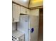 The kitchen has white cabinets and appliances at 7941 58Th N Ave # 106, St Petersburg, FL 33709