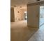 Spacious living room with carpeted floors and an open layout at 7951 58Th N Ave # 106, St Petersburg, FL 33709