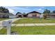 Charming home with well-maintained front yard, sidewalk and mailbox on a sunny day at 811 Pebblewood Dr, Brandon, FL 33511