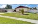 Beautiful single story home, manicured lawn and walkway in a quiet neighborhood at 811 Pebblewood Dr, Brandon, FL 33511